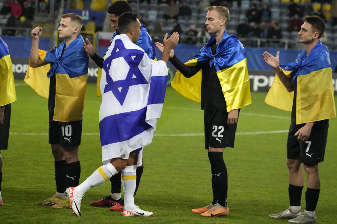 Maccabi Tel Aviv captain Eran Zahavi greets Zorya Luhansk players before the Europa Conference League Group B match in Lublin, Poland, November 9, 2023.