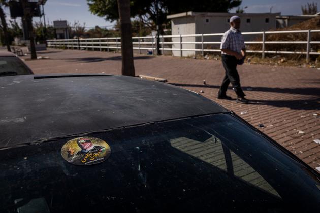 A Hamas "Al-Aqsa Flood" sticker, on a car near Saida stadium.