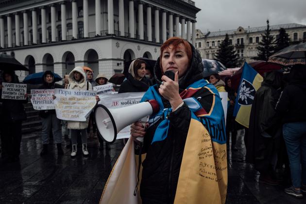Irina, married to an infantryman, demonstrates in favor of an eighteen-month maximum mobilization period for the military, in Kyiv, November 12, 2023. Her husband has been at the front lines since the invasion began in February 2022.