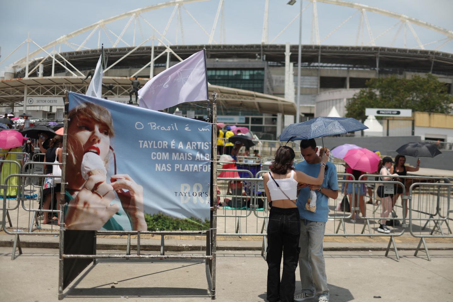 Taylor Swift postpones Rio de Janeiro show, citing record heat a day after fan dies during concert