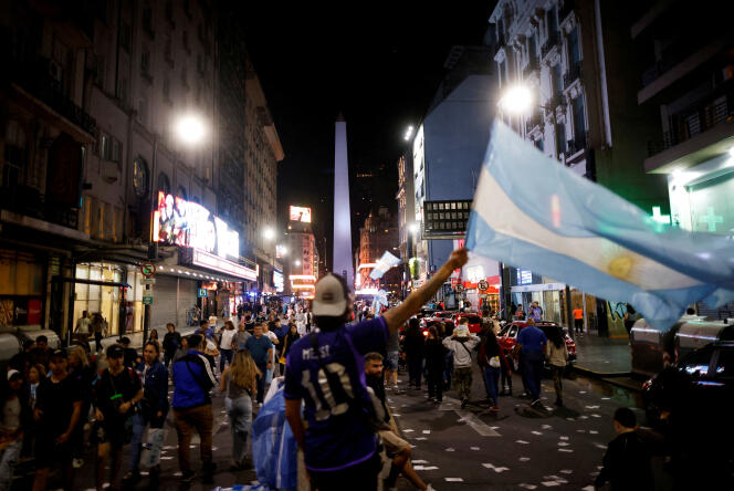 Supporters of Argentine President-elect Javier Milei celebrate his victory in the second round of the presidential election, in Buenos Aires, November 19, 2023.
