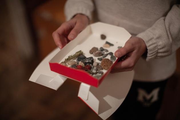 A handful of pebbles, a branch, a few berries, hidden by Natalie Musayelian in a little box of chocolates with the key to her old house.