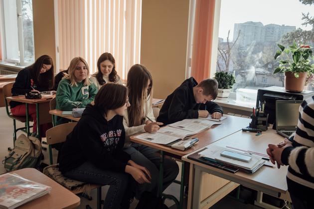 In a classroom at Bucha School Number 3, November 20, 2023. The school has 1,500 pupils, almost 200 more than before the invasion. Some displaced families are still living in the area.