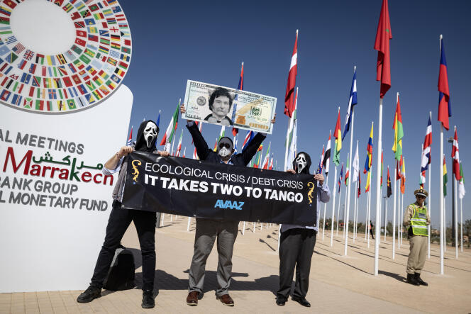 Lors d’une manifestation contre la pauvreté et le changement climatique, en marge
de l’assemblée annuelle du Fonds monétaire international et de la Banque mondiale, à Marrakech (Maroc), le 12 octobre 2023.