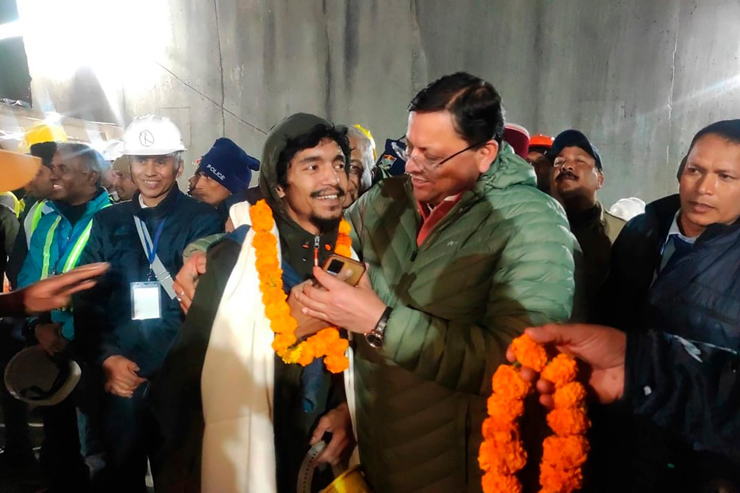 Indian workers are rescued from tunnel after 17 days
