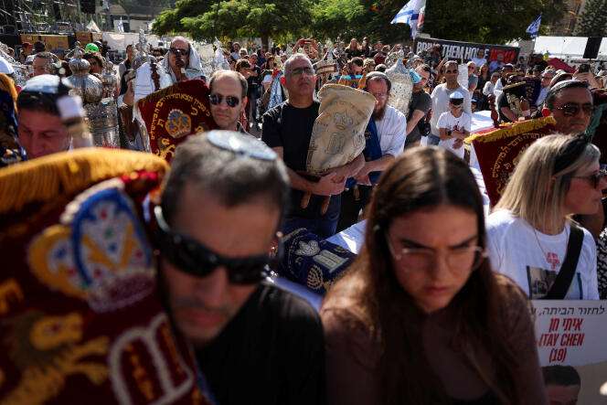 Israelis carry Torah scrolls in Tel Aviv's 
