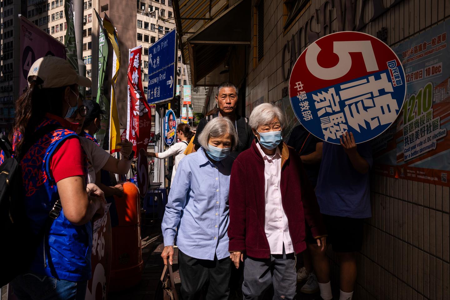 Hong Kong holds first council elections under drastic new rules that shut out pro-democracy candidates