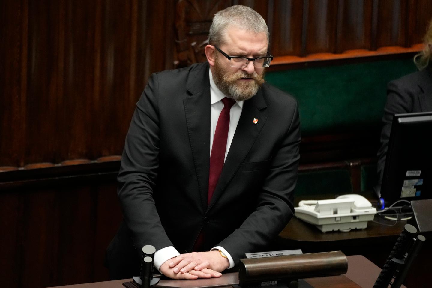 Poland investigates lawmaker for dousing menorah