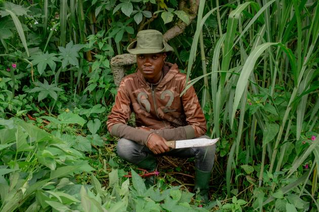 Lumoo, 28, member of the APCLS armed group of the wazalendo coalition, on patrol in the Buhene district of Goma, November 30, 2023.
