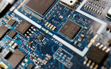 Semiconductor chips are seen on a circuit board of a computer in this illustration picture taken February 25, 2022. REUTERS/Florence Lo/Illustration/File Photo