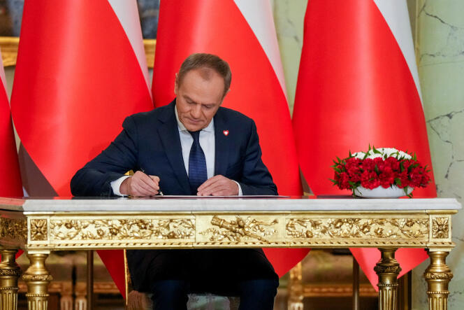 Newly appointed Polish Prime Minister Donald Tusk attends the cabinet swearing-in ceremony at the Presidential Palace in Warsaw, Poland December 13, 2023.