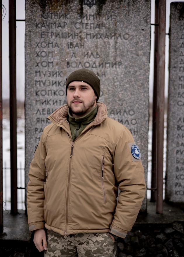 Mi-8 commander "Pavlo" in front of a monument to Ukrainian soldiers, December 15, 2023.