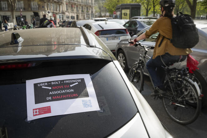Lors d’une manifestation de chauffeurs VTC, à Paris, en mars 2022.