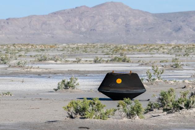 The sample return capsule from NASA's Osiris-REx mission, containing samples of the asteroid Bennu, shortly after landing in the Utah desert (USA) on September 24, 2023.