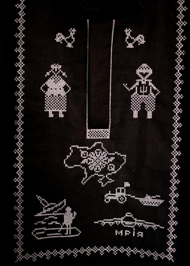 The symbols of the war against Russia embroidered on a traditional Ukrainian shirt ("vyshyvanka") in a Kyiv tourist store. Since the Russian invasion, "vyshyvanka" has become a real craze.