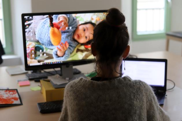 Watching a baby camera from the office.