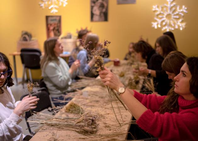 A "didukh"-making workshop at the National Museum of the History of Ukraine, in Kyiv, on December 23, 2023. The "didukh," which means "spirit of the ancestors," is a traditional Christmas decoration made from ears of wheat, symbolizing fertility.