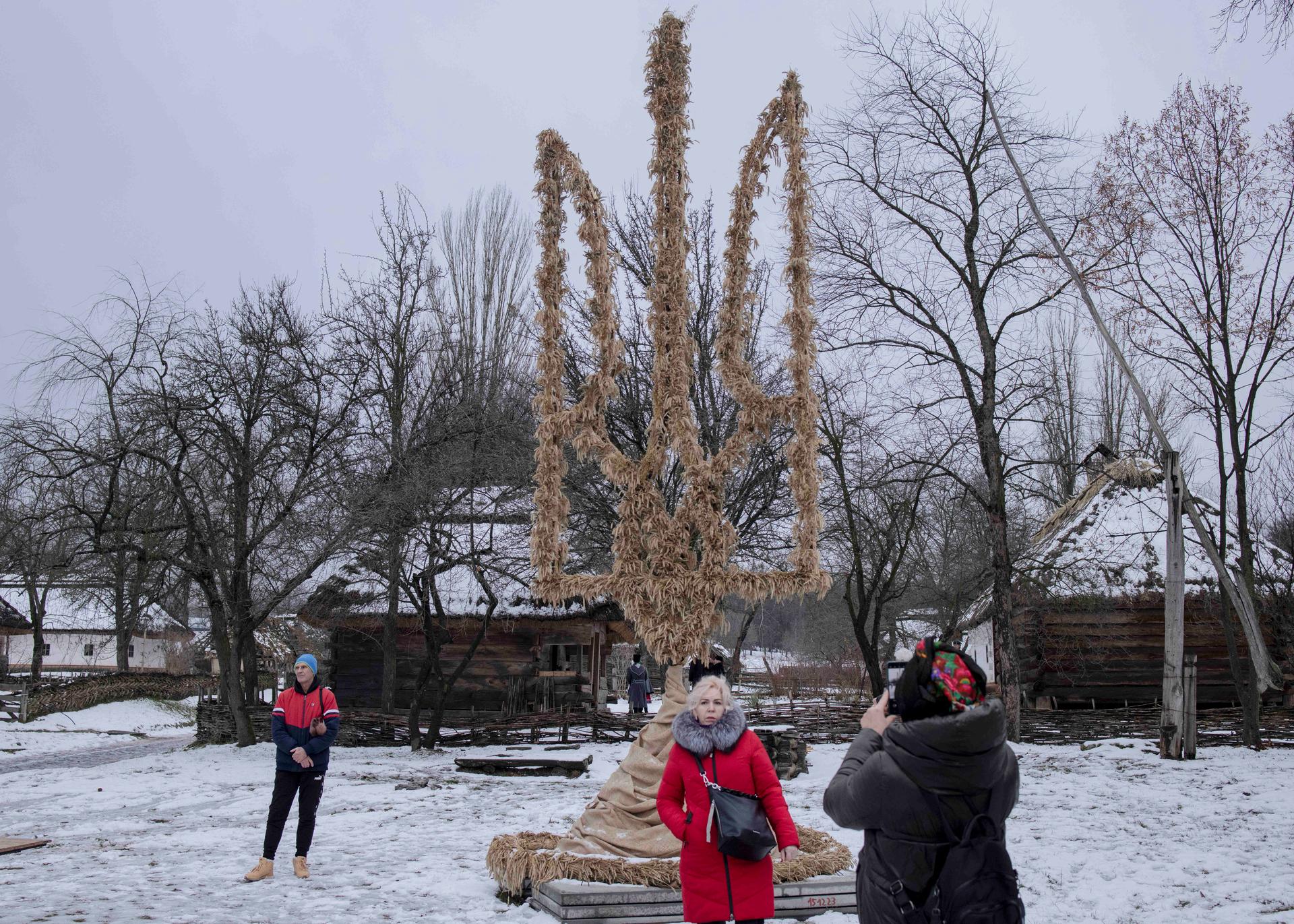 A giant "didukh" in the shape of the Ukrainian coat of arms, made by a paratrooper from the 80th brigade, in Pyrohiv, a Kyiv suburb, on December 25, 2023.