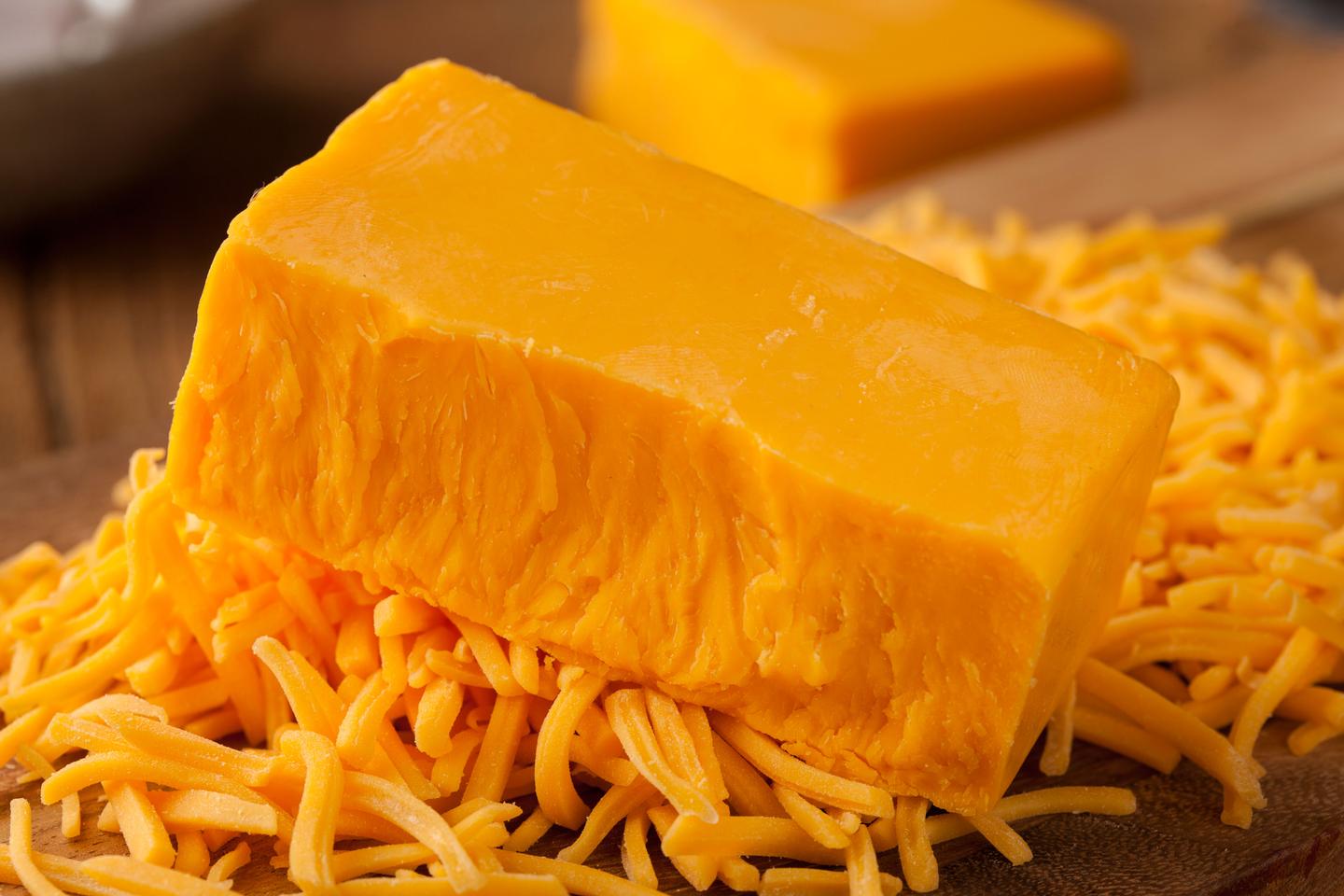 Cheddar: The inimitable taste of microbial interactions