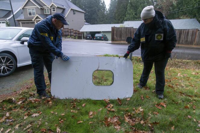 A damaged Alaska Airlines plane door is seen on a private estate in Portland, Oregon, on January 8, 2024, in this photo released by the U.S. Transportation Safety Agency.