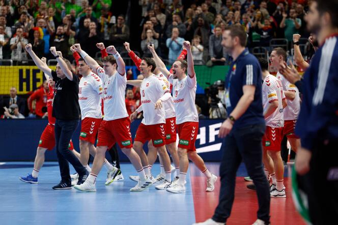 Swiss players celebrate after winning the draw against France in Berlin on Sunday, January 14, 2024.