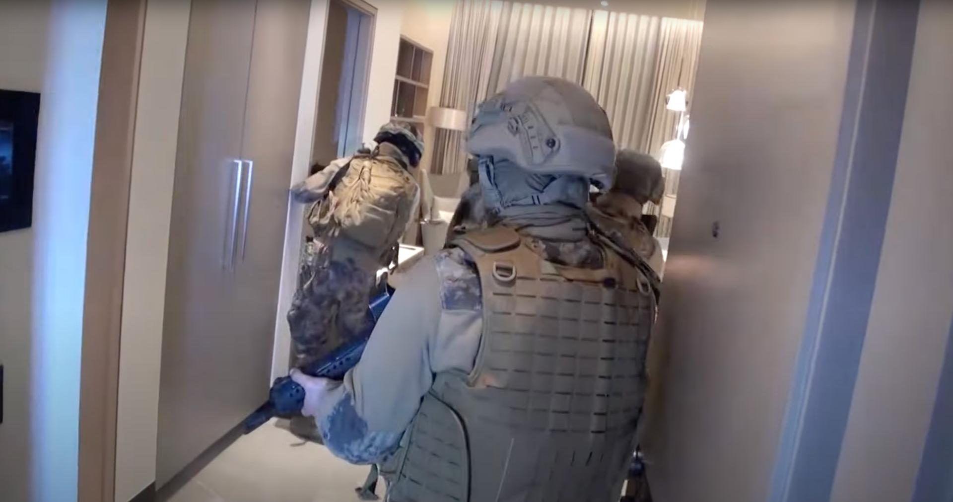 Screenshots from a video released by the Turkish Interior Ministry, taken during the arrest by anti-drug police of Croatian-born drug baron Nenad Petrak, who became a Turkish citizen at the end of 2022, in Istanbul on November 18, 2023.
