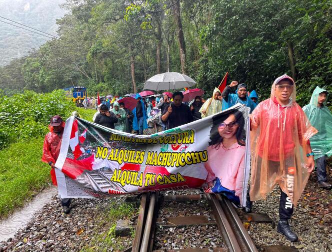 Tour operators and residents demonstrate on the rail tracks near Machu Picchu Pueblo against the opening of online ticket sales to the ruins of the Inca citadel, January 25, 2024.