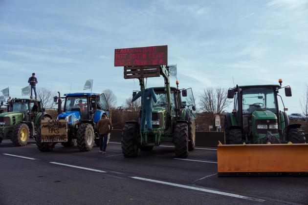 Tractors on the A4 freeway at one of the farmers' blocking points near Jossigny, France, on January 29, 2024.