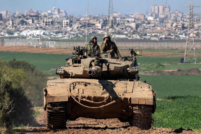 An Israeli assault tank on the border between southern Israel and the Gaza Strip on January 31, 2024.
