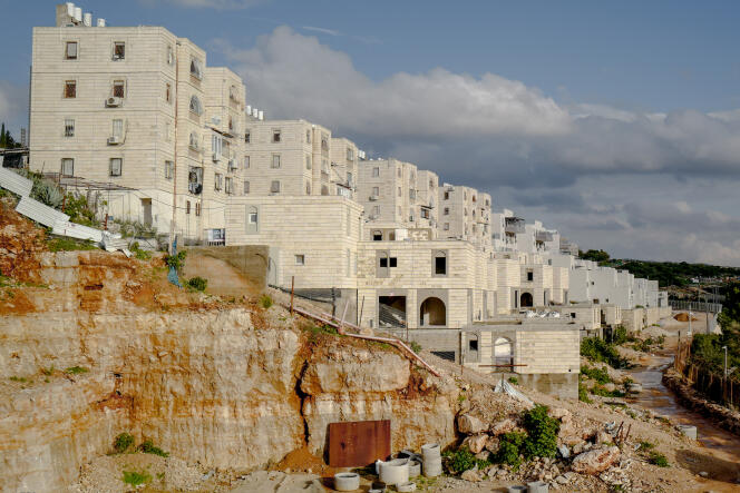 New homes under construction along the fence of the Israeli settlement of Emanuel, in the West Bank, January 31, 2024.