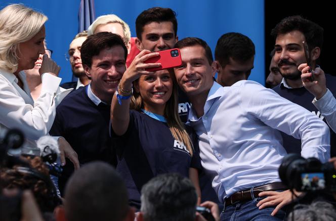 Supporters of far-right Rassemblement National party take a selfie with Jordan Bardella in Beaucaire, France, September 16, 2023.