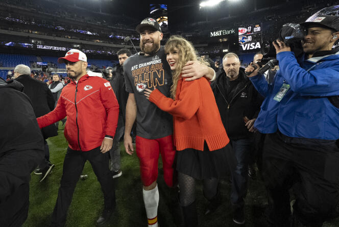 Singer Taylor Swift with her partner, Kansas City Chiefs player Travis Kelce, in Baltimore, on January 28, 2024.