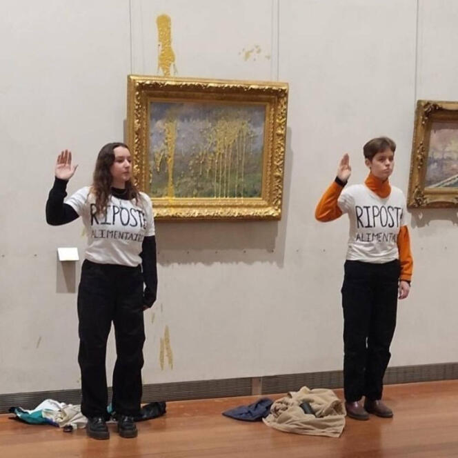 Picture published on the X account of the group Riposte Alimentaire, showing two activists after splashing paint on Claude Monet's 'Printemps.'