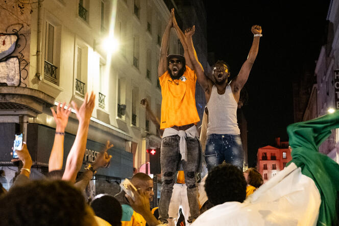 Supporters of Cote d'Ivoire after their team's victory over Nigeria in the Africa Cup of Nations final in the streets around the Chateau d'Eau metro station in Paris on February 11, 2024.