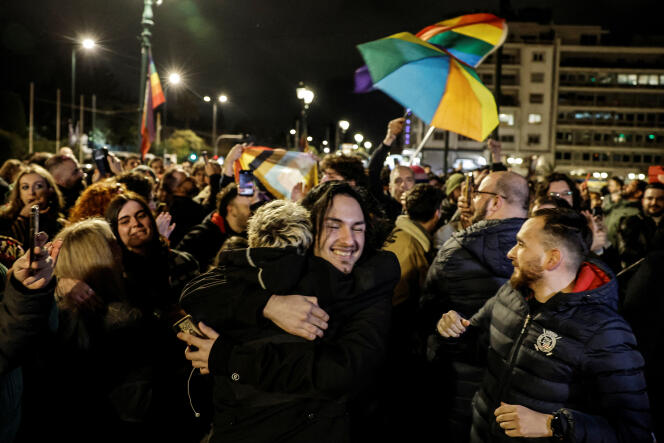Members of the LGBTQ+ community and supporters celebrate in front of the Greek parliament, after the vote in favour of a bill which approved allowing same-sex civil marriages, in Athens, Greece, February 15, 2024.