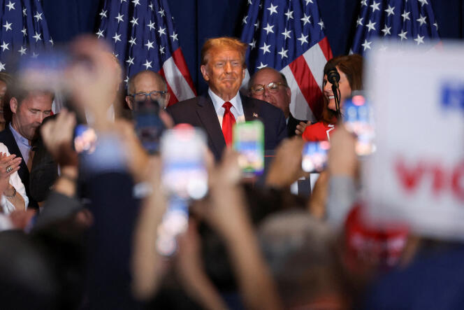 Republican presidential candidate and former President Donald Trump stands on stage as he hosts a South Carolina Republican presidential election party in Columbia, South Carolina, February 24, 2024.