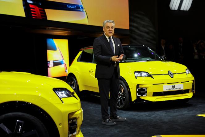 Renault Group's CEO Luca de Meo, speaks as he stands next to the Renault 5 Electric car displayed on the media day of the 91st Geneva Auto Show, in Geneva, Switzerland, February 26, 2024.