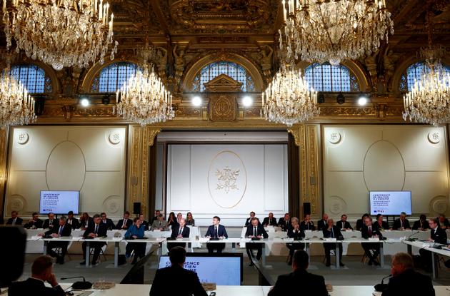French President Emmanuel Macron (center) at the Ukraine support conference at the Elysée Palace, Paris, on February 26, 2024.