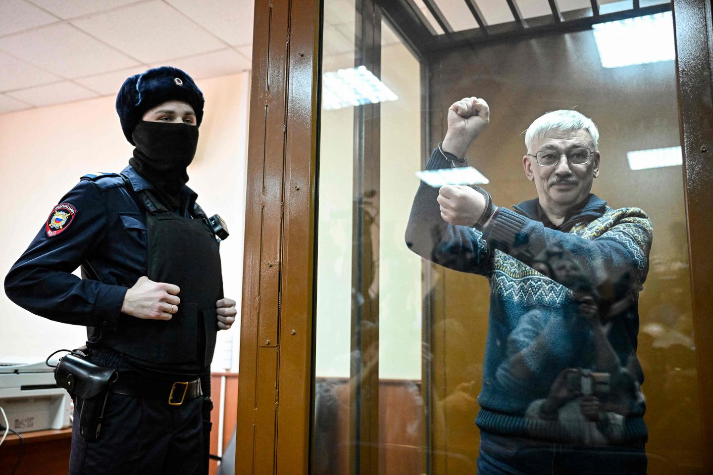 Russian court sentences Oleg Orlov, co-chair of a Nobel-winning rights group, to 30 months in prison