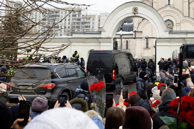 A hearse, which reportedly transports a coffin with the body of Russian opposition politician Alexei Navalny, arrives at the Soothe My Sorrows church before a funeral service and farewell ceremony in Moscow, Russia, March 1, 2024. REUTERS/Stringer