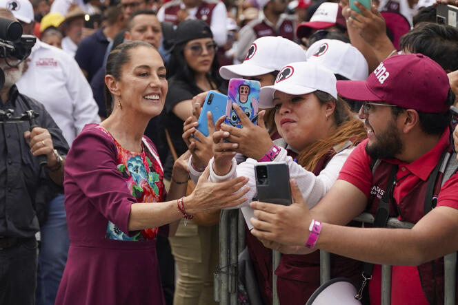 Presidential candidate Claudia Sheinbaum greets supporters upon her arrival at her opening campaign rally at the Zocalo in Mexico City, Friday, March 1, 2024. 