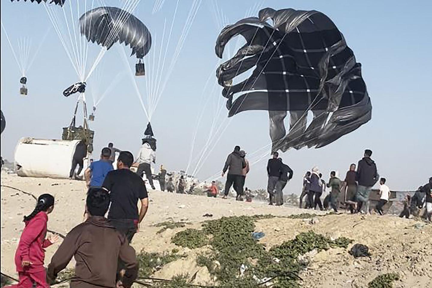 Israel agrees to framework for a Gaza cease-fire, as US airdrops begin