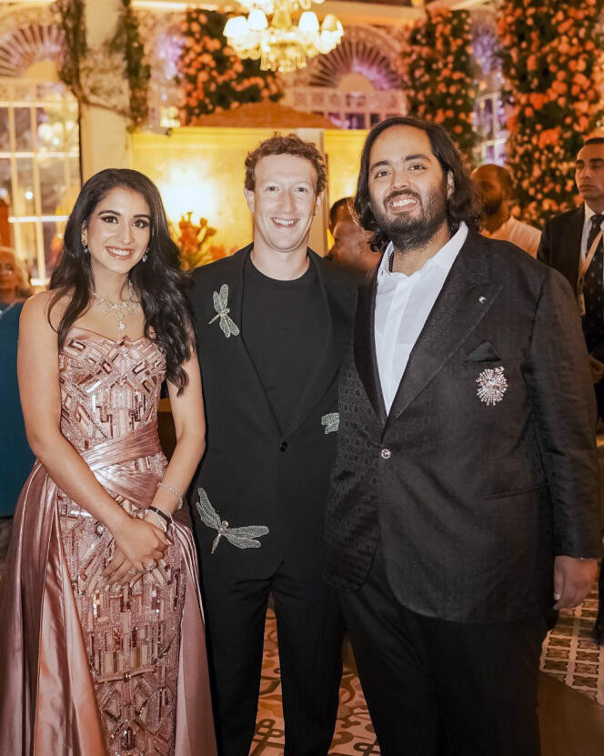 This photograph released by the Reliance group shows Mark Zuckerberg, center, posing for a photograph with billionaire industrialist Mukesh Ambani's son Anant Ambani, right, and Radhika Merchant at their pre-wedding bash in Jamnagar, India, Saturday, Mar. 02, 2024.