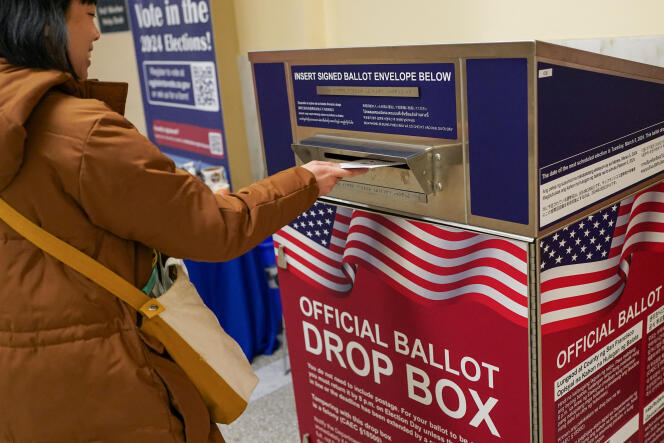 A voter casts their ballot during early voting, a day ahead of the Super Tuesday primary election, at the San Francisco City Hall voting center in San Francisco, California, U.S. March 4, 2024