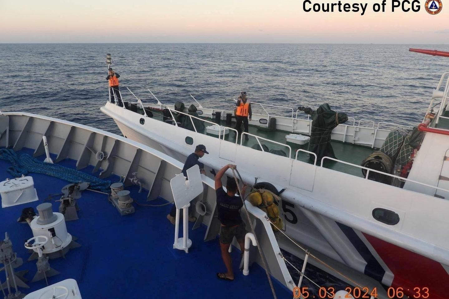 Collisions between Philippines and China coast guard vessels damage boats and crew