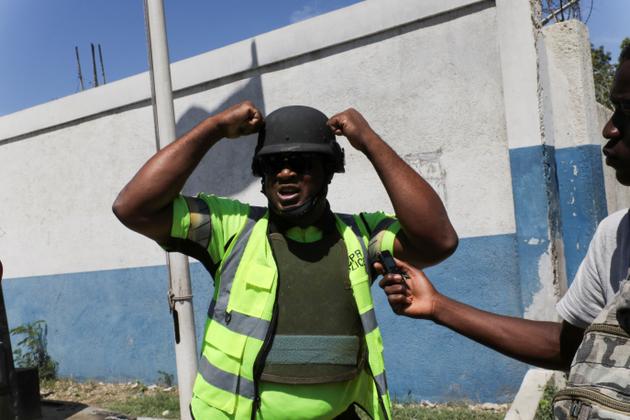 Police officers demonstrating outside Haiti's police headquarters to demand that the bodies of their colleagues who died during operations against gangs be recovered and buried. Port-au-Prince, Haiti, March 1, 2024.