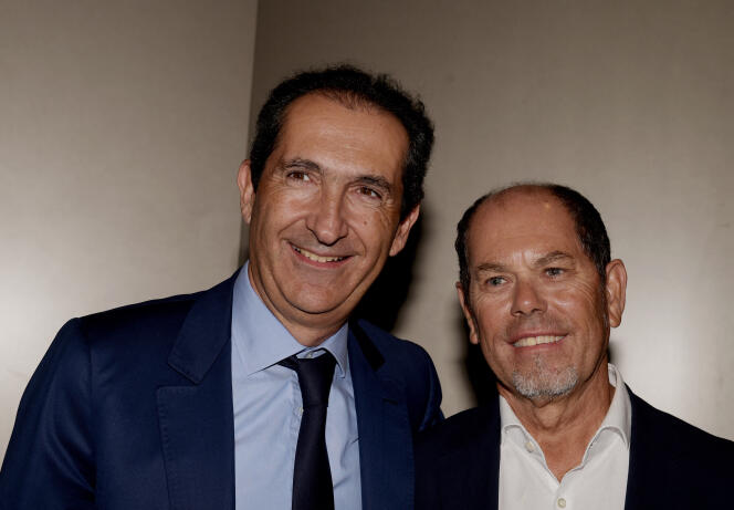 Patrick Drahi, le propriétaire d’Altice, et son ancien associé Armando Pereira, à Paris, le 9 octobre 2018. 