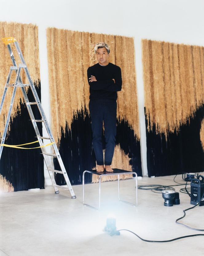 Joël Andrianomearisoa in front of one of his works, at the Parisian gallery Almine Rech, on March 4.