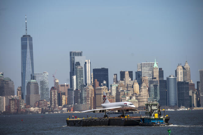  A retired British Airways Concorde supersonic airliner is moved on a barge up the Hudson River on March 13, 2024, seen from Bayonne, New Jersey.