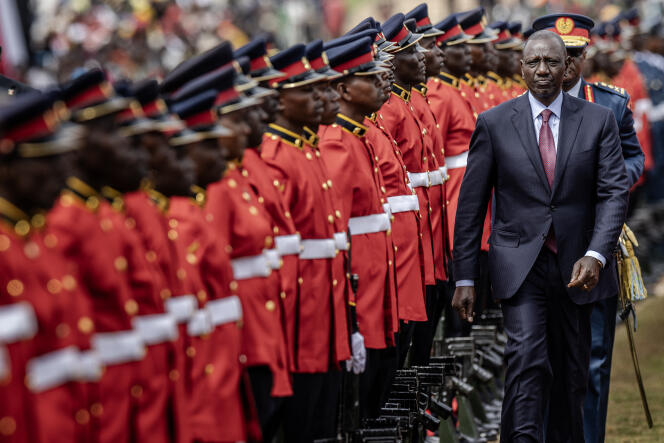 Kenyan President William Ruto reviews a guard of honor during the Independence Day celebrations in Nairobi on December 12, 2023.